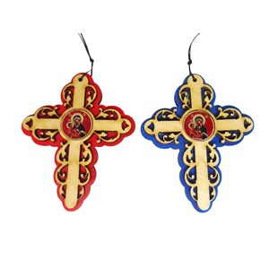May include: Two wooden crosses with intricate designs, one red and one blue, each featuring a gold-colored center with a religious icon of Mary and Jesus.