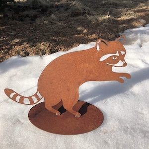 Rustic Metal Raccoon Rusty yard art.