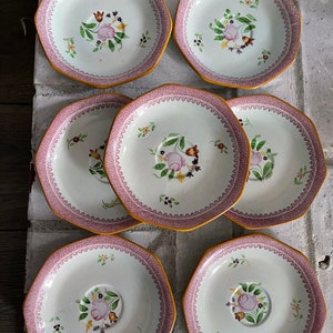 Set of 7 Calyx Ware Hand Painted Saucers