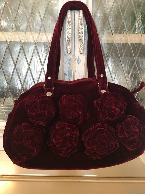 burgundy velvet handbag