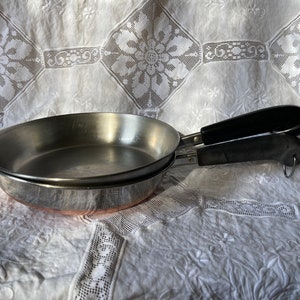 One Revere Ware 9 inch Pan