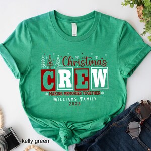 May include: Kelly green t-shirt featuring the text "Christmas CREW" in red and white. The shirt also includes the text "MAKING MEMORIES TOGETHER" and "WILLIAMS FAMILY 2025".