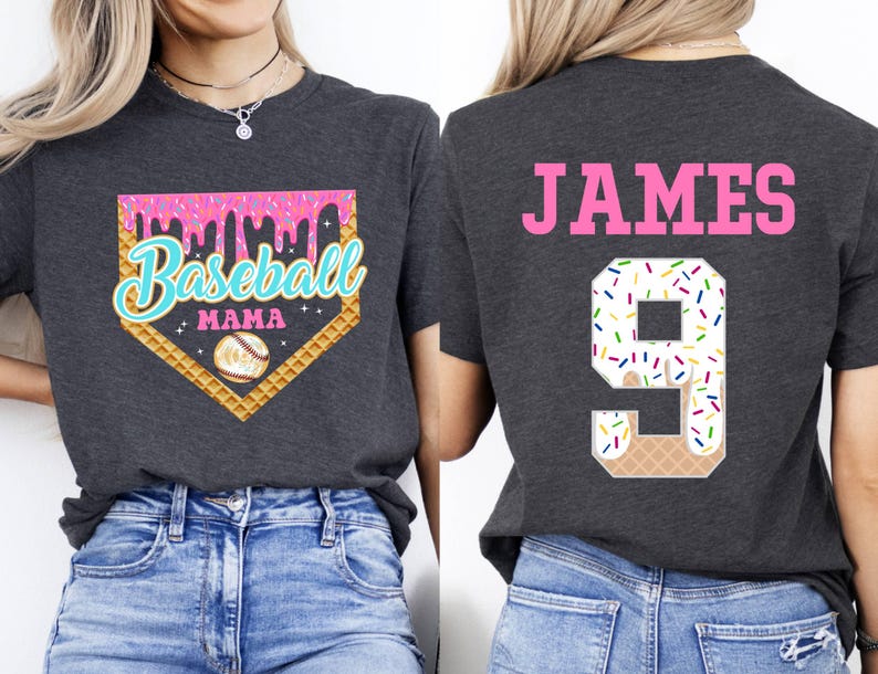 May include: Two gray t-shirts with a baseball theme. One shirt has a pink and white baseball diamond with the text "Baseball Mama" and a baseball graphic. The other shirt has the text "JAMES" and the number "9" with a pink and white ice cream cone graphic.