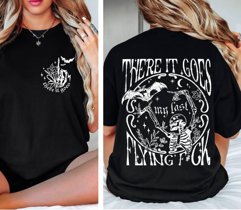 K&ouml;nnte beinhalten: Schwarzes T-Shirt mit einem wei&szlig;en Grafikdruck eines Skeletts, das eine Fledermaus h&auml;lt, und dem Text "There it goes my last flying f*ck".