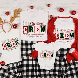 May include: A family Christmas pyjama set with white tops displaying "Christmas CREW" in red and green, and matching black and white checked trousers. The tops include the text "MAKING MEMORIES TOGETHER WILLIAMS FAMILY 2025". Red accents and Christmas baubles complete the festive look.