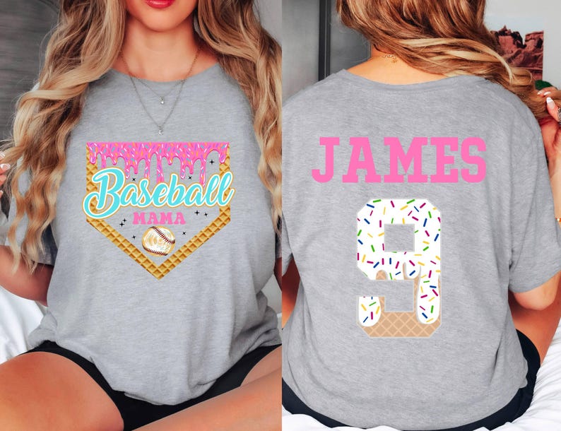 May include: Gray t-shirt with a pink baseball diamond graphic that says "Baseball Mama" and a waffle cone with sprinkles. The back of the shirt has the name "JAMES" in pink letters and a waffle cone with sprinkles in the shape of the number 9.
