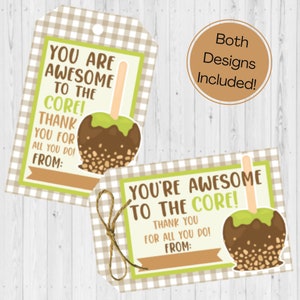 May include: Two gift tags with a gingham pattern border. Each tag features a caramel apple graphic and the text "YOU ARE AWESOME TO THE CORE! THANK YOU FOR ALL YOU DO! FROM:" and "YOU'RE AWESOME TO THE CORE! THANK YOU FOR ALL YOU DO! FROM:"