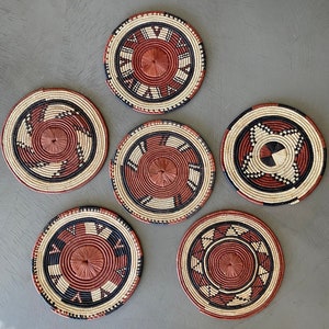 Colorful and woven African underdishes, ethnic art