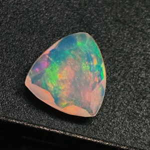 AAA++ Welo Faceted Ethiopian Opal: 1.30 Carat Trillion Cut Gemstone 8.8X8.8X3.5 MM