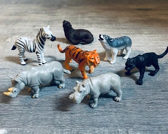 7 Vintage PVC Animal Figures Cake Toppers Seal Zebra Hippo Panther Rhino Wolf