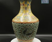 Qing Dynasty Famille-Rose double wall vase with jumping fish leads the Chinese