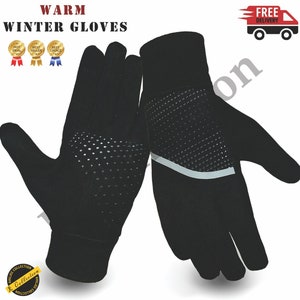 May include: A pair of black winter gloves with a textured pattern on the fingertips. The gloves have a reflective strip on the back of the hand.