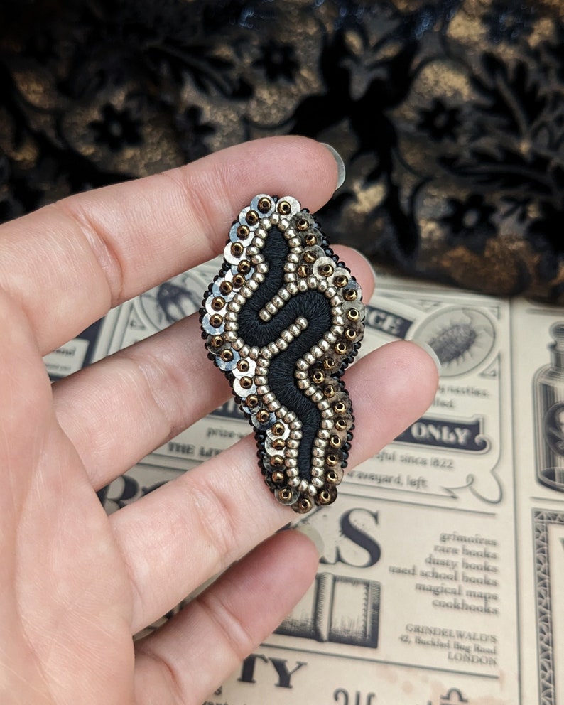 Le Fabularium Black and brown snake brooch in pearls and sequins, hand embroidered. image 1