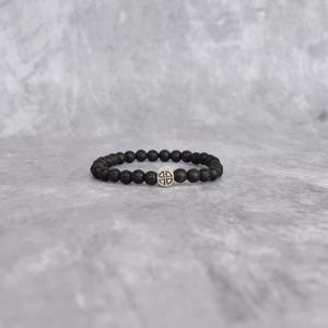 Genuine Lava beaded bracelet* Stretchable shield knot charm bracelet for men* Diffuser bracelet * Unique Gifts for him or her