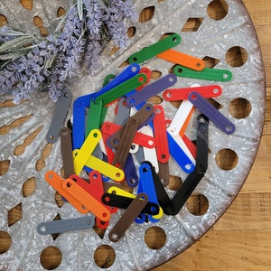 12 plastic hooks, Mixed media supplies, Altered art, Plastic fasteners, Assemblage, Plastic bits for art