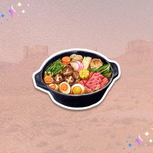 May include: A sticker featuring a watercolor illustration of a Japanese hot pot, or nabe. The black pot is filled with various ingredients, including sliced meat, vegetables, mushrooms, and eggs. The background is a soft pink with a desert landscape.