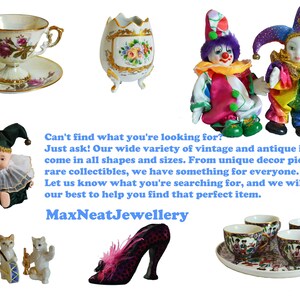 May include: A collection of vintage items including a teacup and saucer, a decorative egg-shaped vase, two clown dolls, a doll in a jester outfit, three cat figurines, a high-heeled shoe, and a set of teacups on a tray. The text "MaxNeatJewellery" is also visible.
