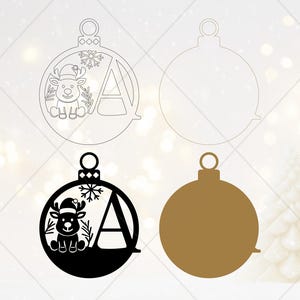 May include: Christmas ornament designs featuring a reindeer wearing a Santa hat, a snowflake, and the letter "A". One design is black, and the other is a line drawing. The ornaments have a loop for hanging.