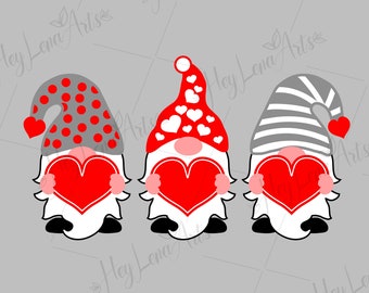 May include: Three gnomes holding red hearts. The gnomes are wearing gray and white hats with different patterns. The gnome on the left has a gray hat with white polka dots, the gnome in the middle has a white hat with red hearts, and the gnome on the right has a gray and white striped hat.