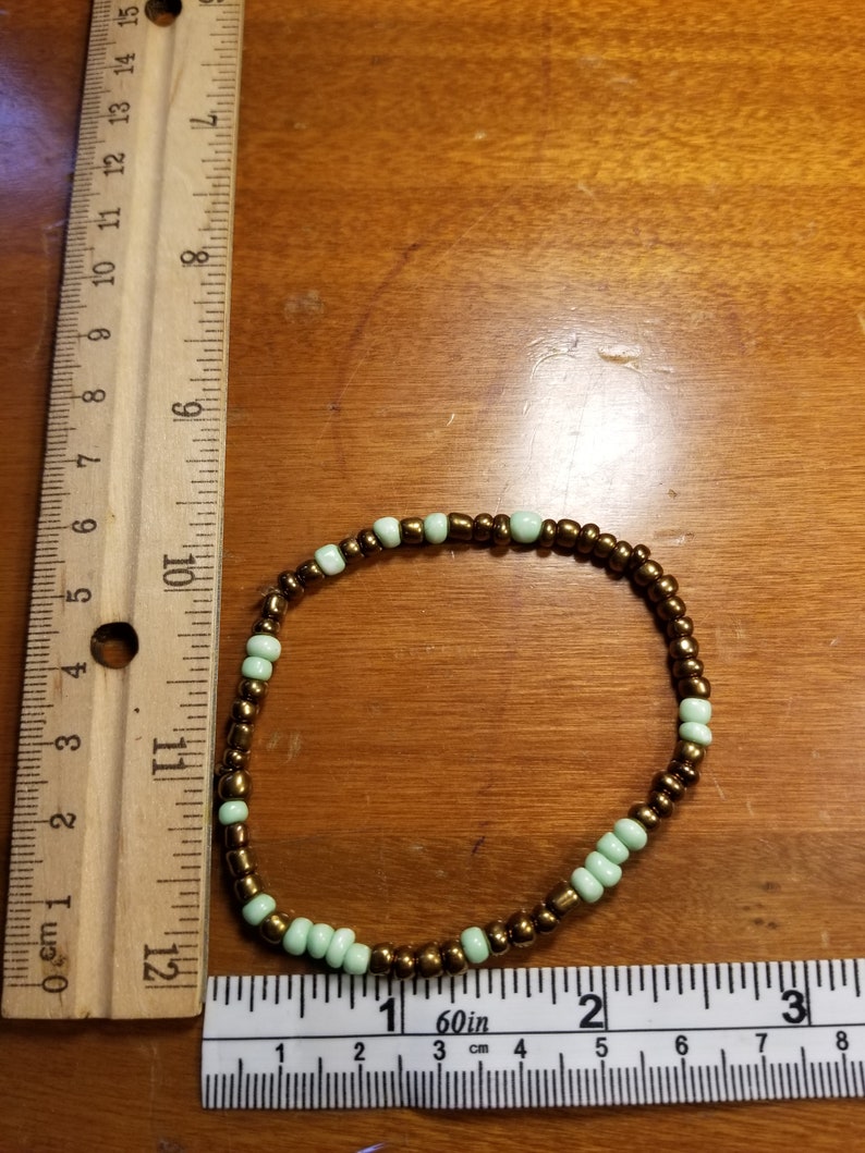 8 inch. Vintage Bronze and Green Bead bracelet