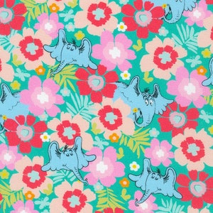 May include: A teal blue fabric with a repeating pattern of pink, red, and white flowers and blue elephants with large ears. The elephants have a whimsical expression on their faces.