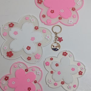 Lindo posavasos y llavero de Sakura