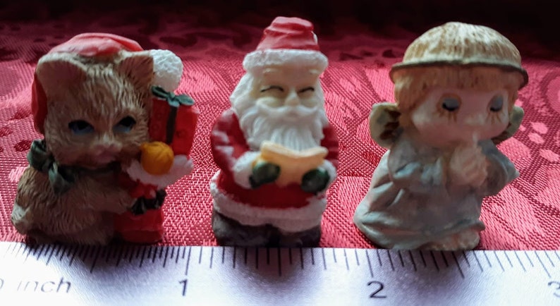 Santa Claus and Cat with Stocking Lot of Three Sculpted Polyresin Christmas Figurines Angel