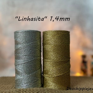Può includere: Due bobine di filo metallico, una argentata e una dorata, con il testo "Linhasita" 1,4 mm.