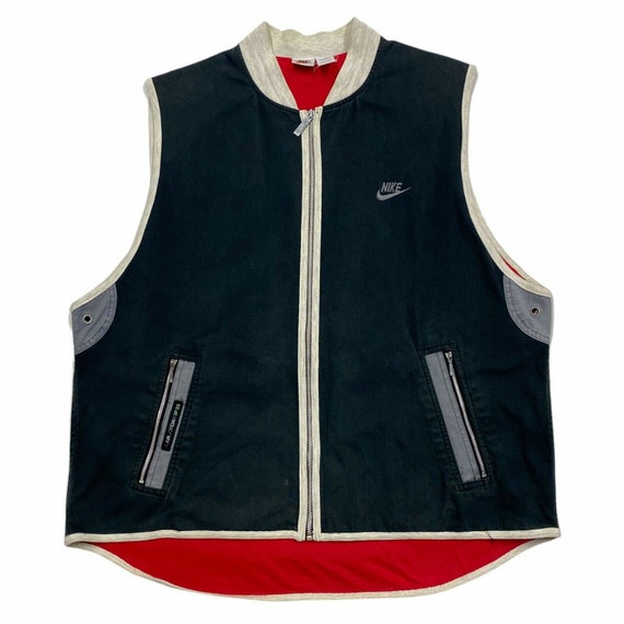 nike sleeveless jacket