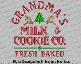 May include: Red and green embroidery design for a Christmas-themed business called "Grandma's Milk & Cookie Co." with the text "Fresh Baked" below. The design features a Christmas tree, reindeer, and a star.
