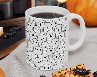 Halloween-spookmok: griezelige herfstkoffiekop