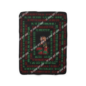 May include: Black and red blanket with a graphic print of Freddy Krueger from the movie "A Nightmare on Elm Street". The text "One, two, Freddy's coming for you..." is printed on the blanket.