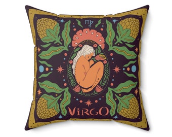 May include: A decorative pillow with a dark purple background featuring a stylized illustration of a woman in a floral wreath with the text "VIRGO" and the astrological symbol for Virgo.