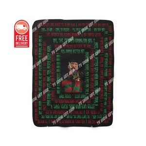 May include: Black and red blanket with a graphic of Freddy Krueger from the movie 'A Nightmare on Elm Street'. The blanket features a repeating pattern of text from the movie, including the quote 'One, two, Freddy's coming for you'.
