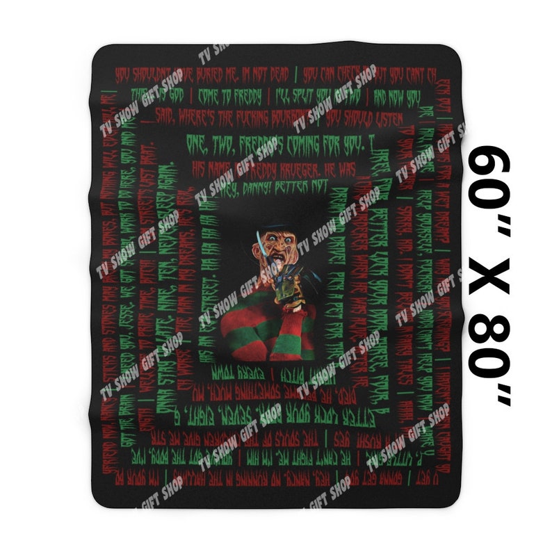 May include: A black and red throw blanket with a graphic of Freddy Krueger from the movie "A Nightmare on Elm Street". The blanket features a repeating pattern of text from the movie, including the famous line "One, two, Freddy's coming for you".