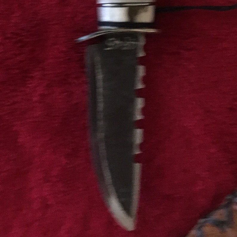 Hand crafted in the Black Hills from crosscut saw blad,Silver spoon and shed antler