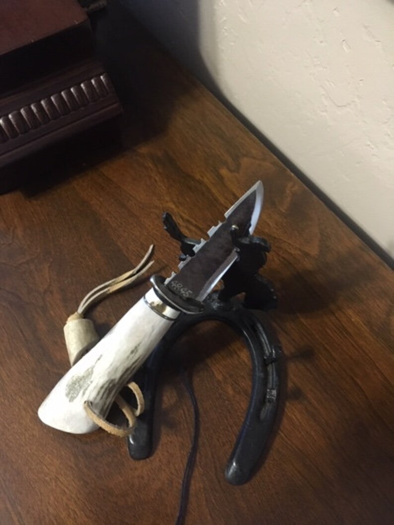 Hand crafted in the Black Hills from crosscut saw blad,Silver spoon and shed antler