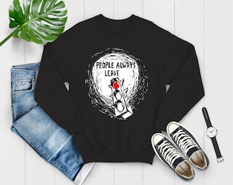 May include: Black sweatshirt with a white graphic of a traffic light with the red light on and the text "People Always Leave".