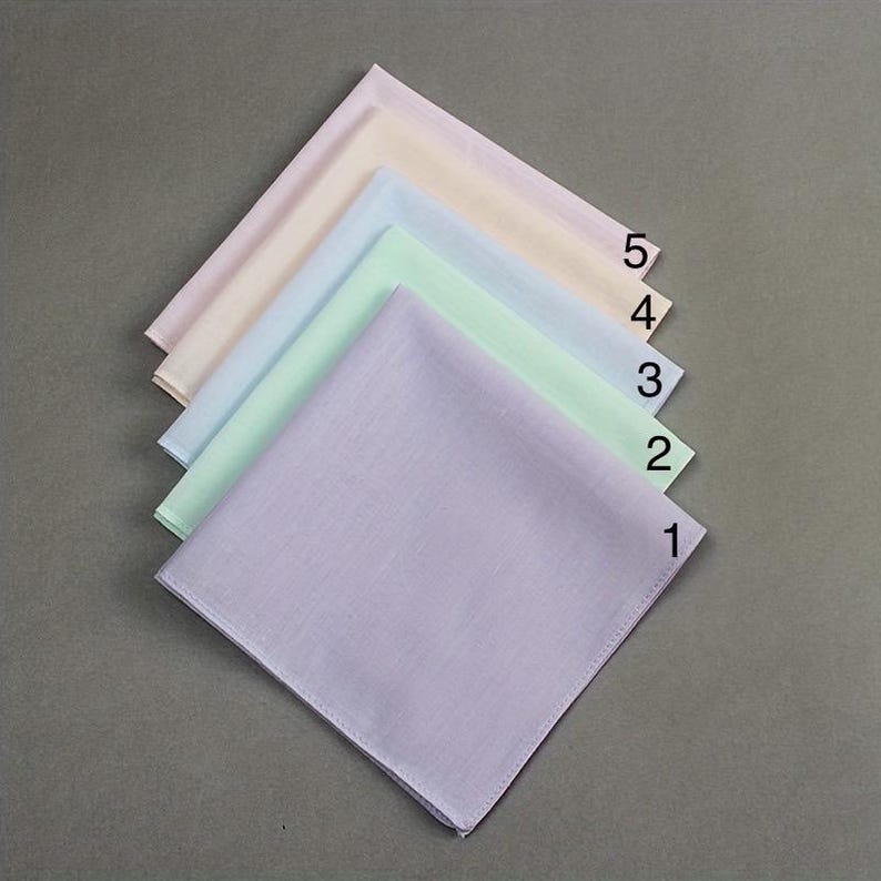 Five pastel cotton pocket squares numbered 1 to 5 (lavender, mint green, light blue, cream and pink), the fabric color options.