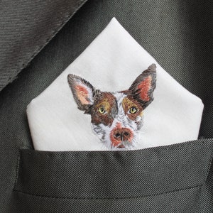 Embroidered dog portrait pocket square worn in a charcoal suit, a keepsake wedding accessory for a dog dad.