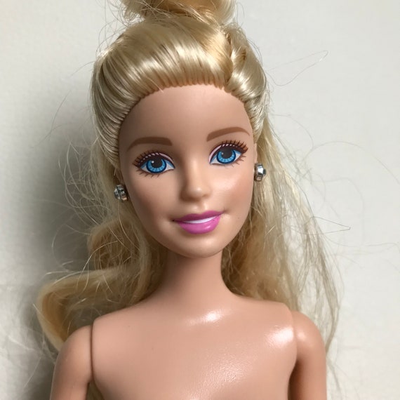 barbie doll head earrings