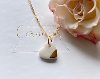 Necklace chain with a small heart pendant in porcelain and gold