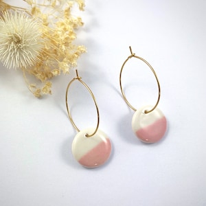Hoop earrings with a white and pink porcelain circle