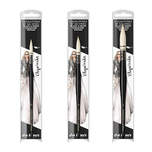 May include: Three Da Vinci Kagalovska Black & White Signature Edition paintbrushes. Each brush is packaged in a white and black sleeve with the text "KAGALOVSKA BY DA VINCI BLACK & WHITE SIGNATURE EDITION". The brushes have black handles and white bristles.