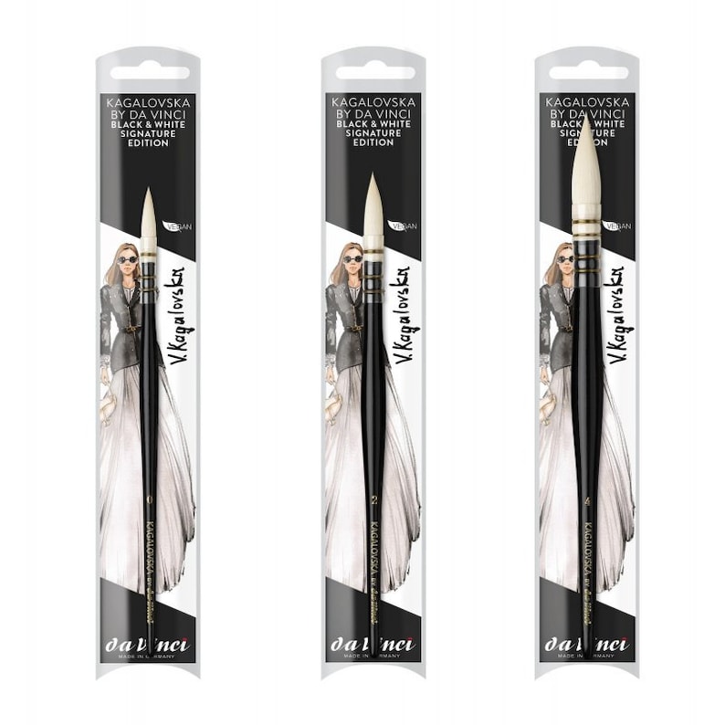 May include: Three Da Vinci Kagalovska Black & White Signature Edition paintbrushes. Each brush is packaged in a white and black sleeve with the text "KAGALOVSKA BY DA VINCI BLACK & WHITE SIGNATURE EDITION". The brushes have black handles and white bristles.