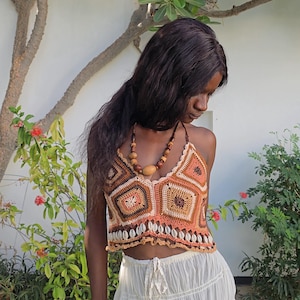 Bogolan inspired crop top with cowries shells