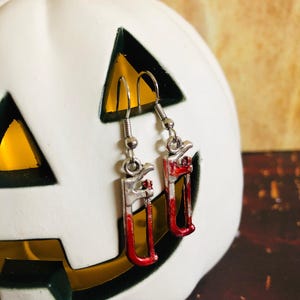 Horror Earrings, Bloody Handsaw Earrings, Hacksaw Earrings, Horror Jewelry, Horror Movie Fan Gift, Tool Earrings, Scary Movie Fan Earrings