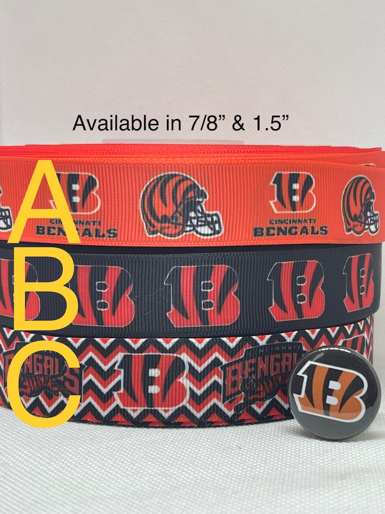 Cincinnati Bengals-inspirerat grosgrainband och/eller matchande 2,5 cm flatbacks. Perfekt för bågtillverkning och många andra hantverk. bild 1
