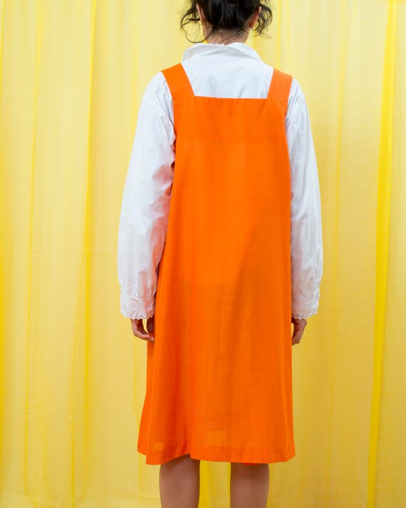 orange pinafore