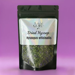 May include: A black pouch with a clear window showing dried hyssop. The label reads "The Herbal Guru" and "Dried Hyssop, Hyssopus officinalis". The dried herb is green with small purple flowers, against a purple background.